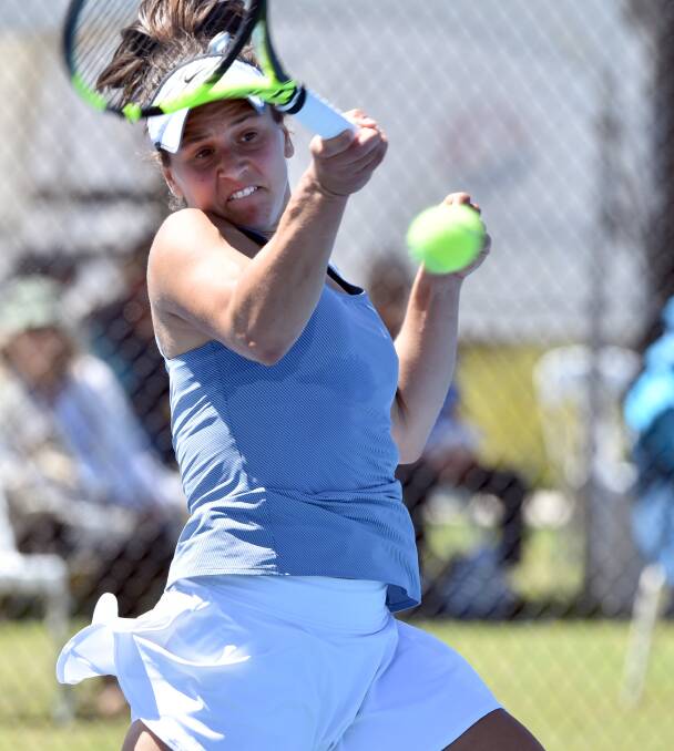 BIG DAY: Samantha Harris pounds a forehand in her gritty three-set win over Kaylah McPhee in round one of the Bendigo International. Picture: GLENN DANIELS