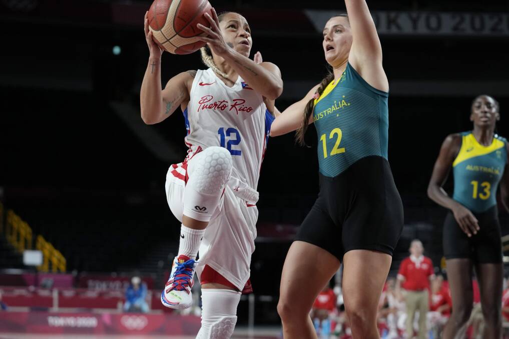 Tessa Lavey defends strongly in the Opals' big win over Puerto Rico. Picture: AP