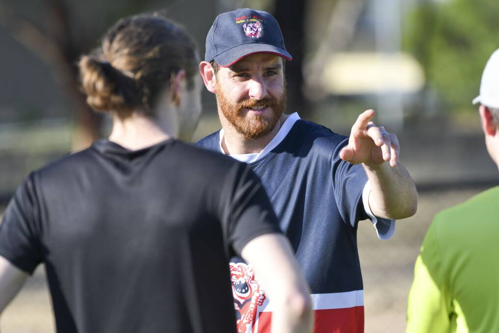 IN CHARGE: New Calivil United coach Glen Scholtes gives instructions at Monday night's first pre-season training session. Picture: NONI HYETT