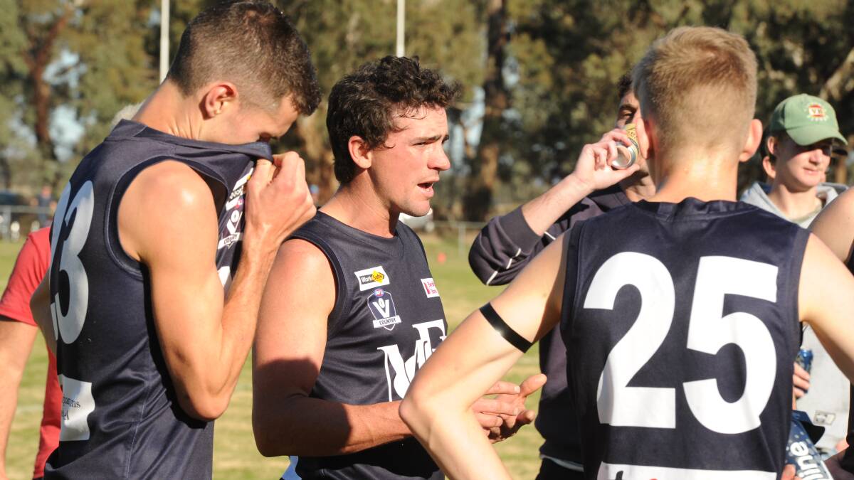 Adam Baird gives out some advice at quarter-time. Picture: KIERAN ILES