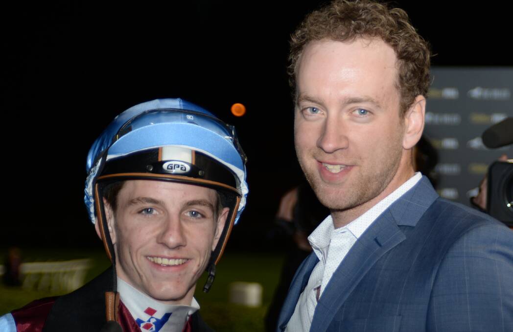 WINNING WAYS: Josh Julius, right, with jockey Beau Mertens after Dubai King won at Moonee Valley. Picture: GETTY IMAGES