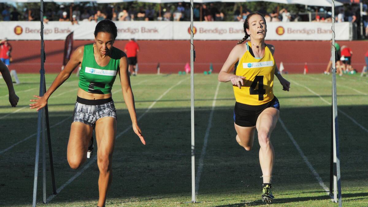 TOO STRONG: Nadine Brown (green) wins the Women's Vase 120m Final.