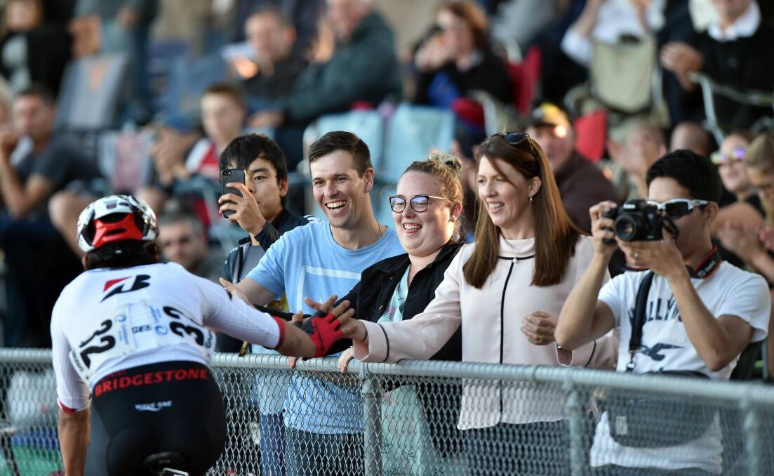 CROWD PLEASER: Japan's Eiya Hashimoto high fives the crowd after his win in the Golden Mile Wheelrace. Pictures: GLENN DANIELS
