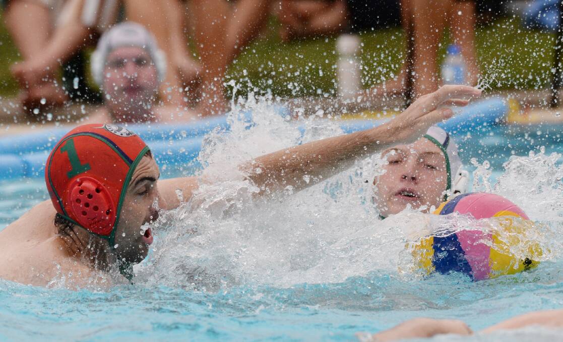 FIERCE COMPETITION: Albury and Bairnsdale clash in one of the men's matches at the Victorian Country Water Polo Championships last Saturday. Picture: DARREN HOWE