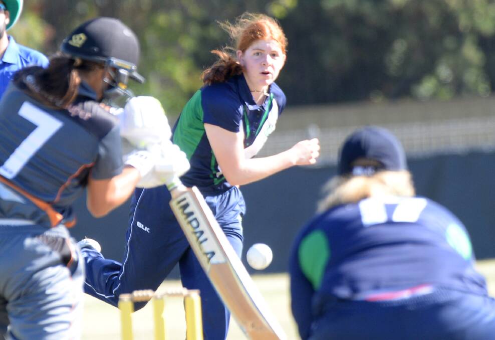 Lucy Cripps bowls for Victoria Country against Northern Territory. Picture: DARREN HOWE