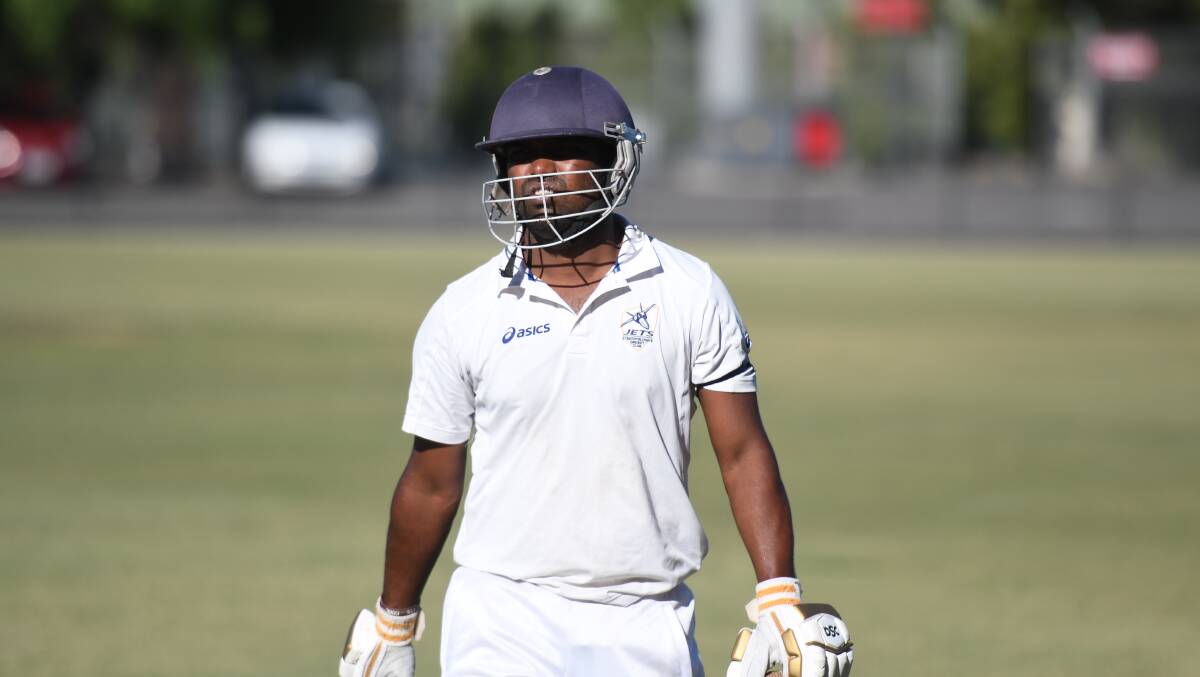 Strathfieldsaye's Chathura Damith walks from the field after his long innings. Picture: ADAM BOURKE