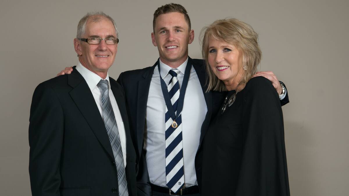 Bryce and Maree Selwood with Joel after he won the Geelong best and fairest award.