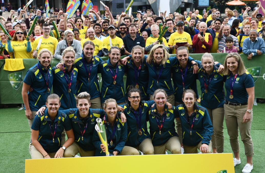The Australian women's cricket team at Federation Square on Thursday. Tayla Vlaeminck is in the back row, third from the left.