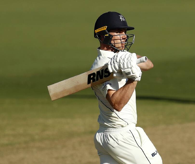 BOUNDARY: James Seymour belts one of his seven fours in his first innings for Victoria in the Sheffield Shield. Picture: GETTY IMAGES
