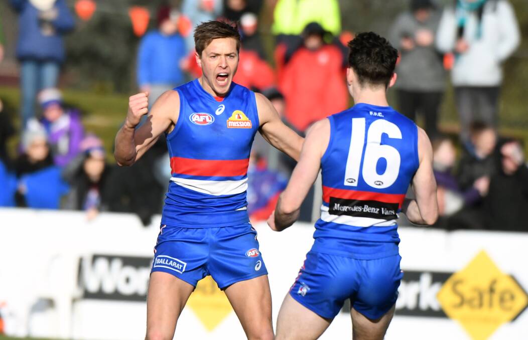 Fergus Greene after kicking a goal on debut for the Western Bulldogs in 2018. Picture: KATE HEALY