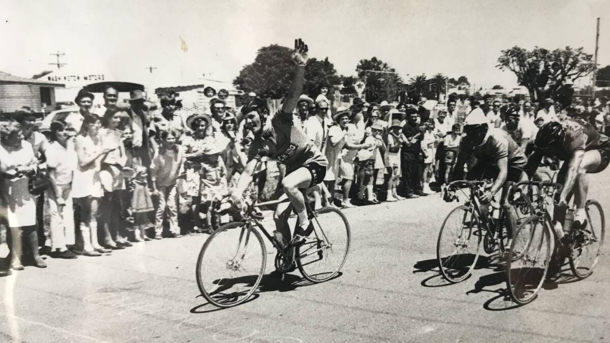 CYCLING GREAT: Frank McCaig celebrating a Herald-Sun Tour stage win in the 1970s.