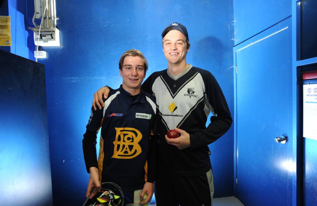 Xavier Crone, right, with Kayde Howard at a recent junior cricket clinic in Bendigo.