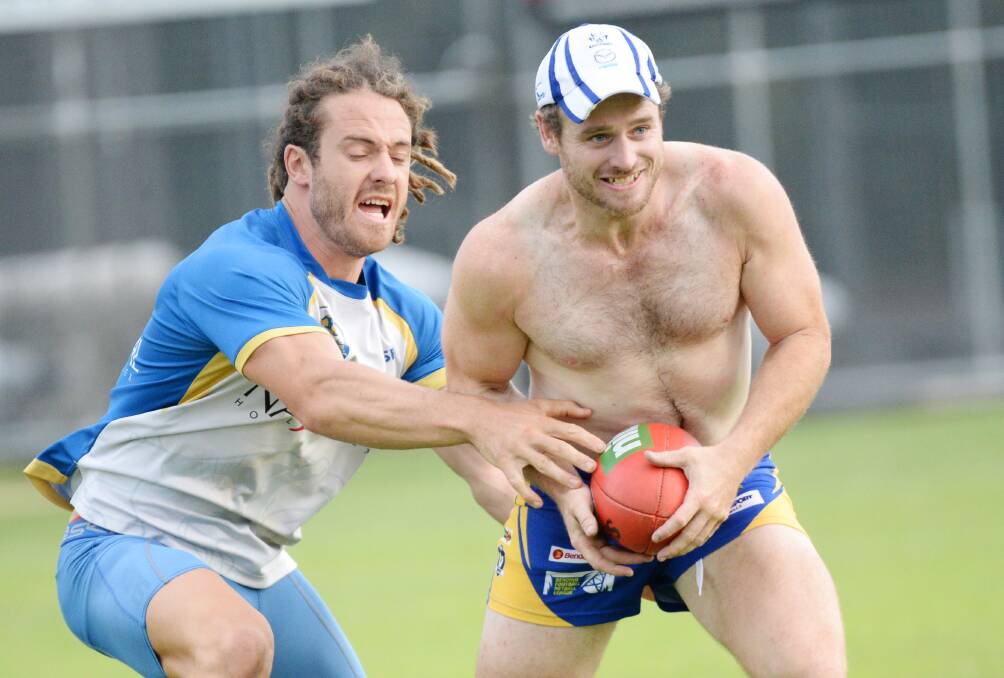 PRESSURE ON: Golden Square skipper Jack Geary tries to tackle midfield team-mate Dale Lowery at training this week. Pictures: DARREN HOWE