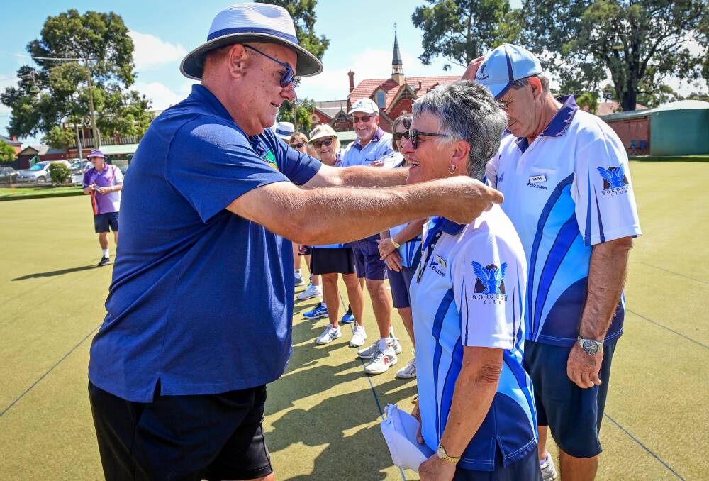 WELL DONE: Eaglehawk's Pam Hughes receives her premiership medal.