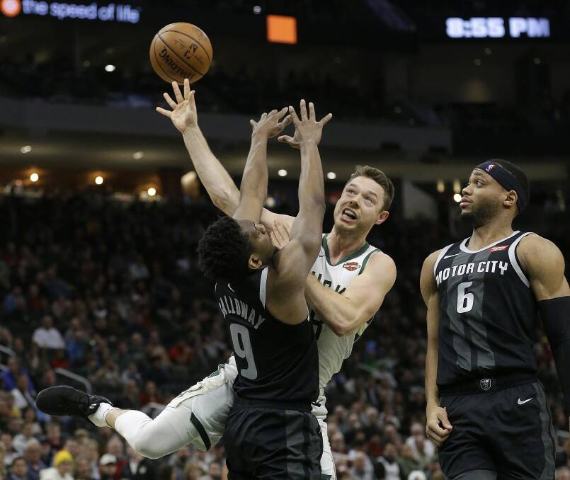 GOOD GAME: Matthew Dellavedoa drives to the basket in Milwaukee's win over the Detroit Pistons on Thursday. Picture: AP