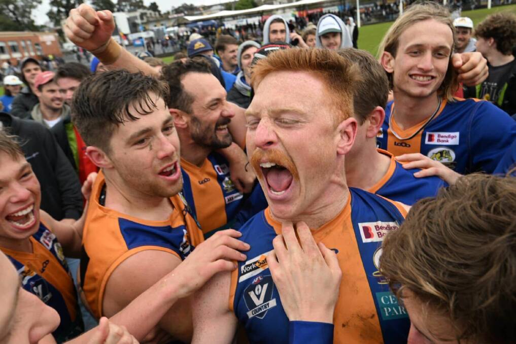 Golden Square players after the final siren of the resves grand final. Picture by Darren Howe