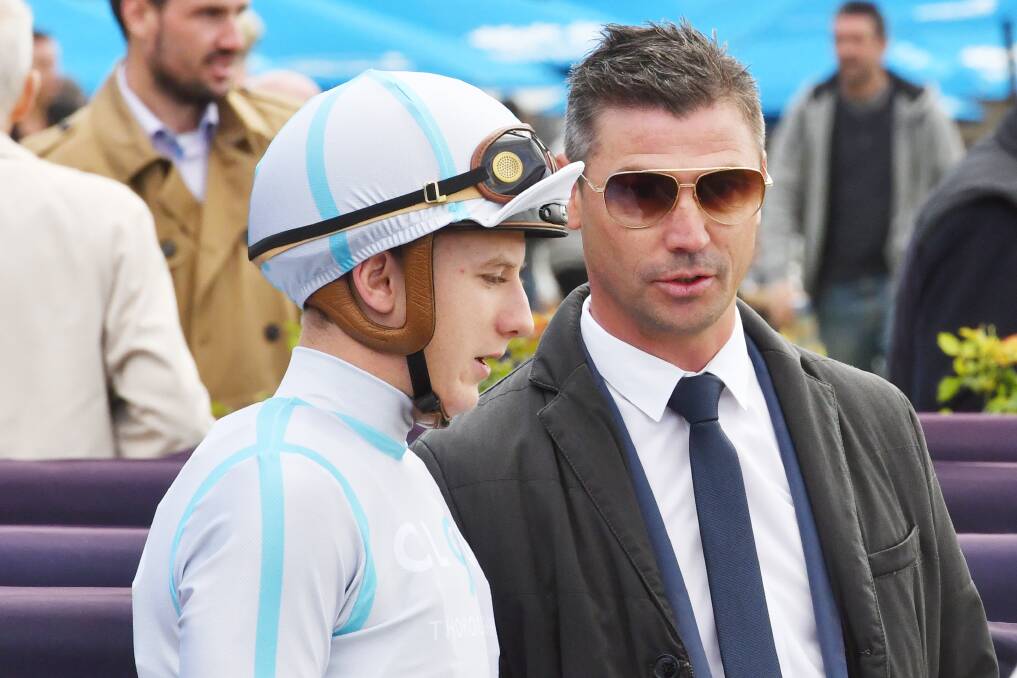 TACTICS: Trainer Brent Stanley talks to jockey Mitch Aitken after two-year-old Invincible Lotus.