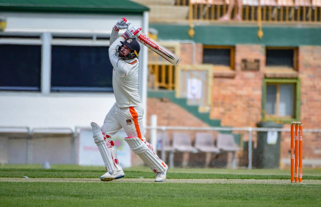 Brayden Stepien belts a boundary in his innings of 223 for Greater Northern Raiders. Picture: PAUL SCAMBLER, LAUNESTON EXAMINER