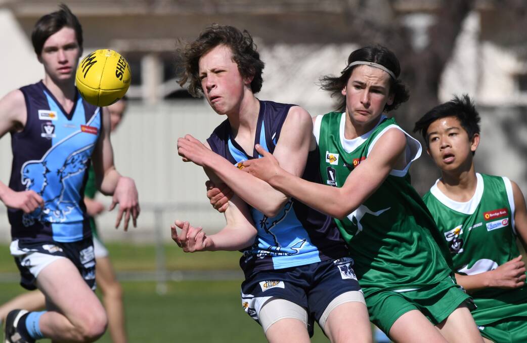 CONTESTED FOOTY: Action from the Eaglehawk versus Kangaroo Flat under-16 reserves preliminary final. Picture: GLENN DANIELS