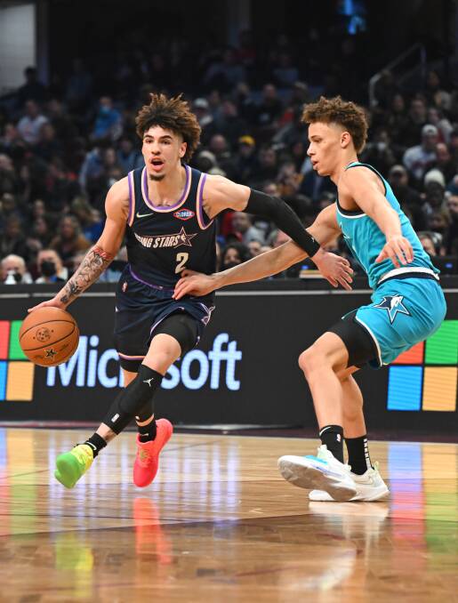BIG TIME: Dyson Daniels guards NBA star LaMelo Ball in this year's Rising Stars Challenge at the NBA All-Star Weekend. Picture: GETTY IMAGES