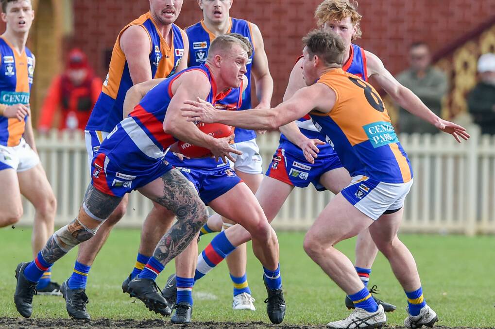 Ethan Minns crashes through a pack against Golden Square in the preliminary final. Picture by Darren Howe
