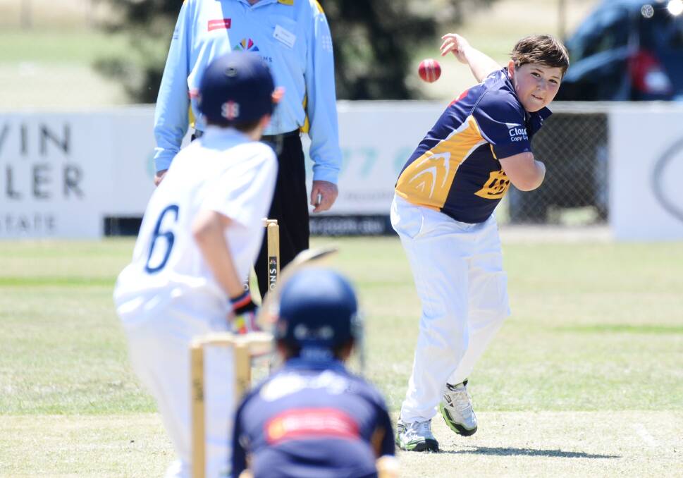 WELL BOWLED: Bendigo under-13B squad member Cooper Orton in action against Murray Valley. Picture: DARREN HOWE