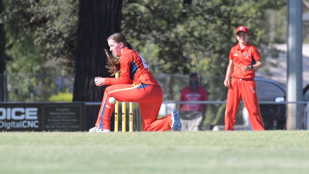 South Australia's Stephanie Beazleigh fields off her own bowling. Picture: NONI HYETT


