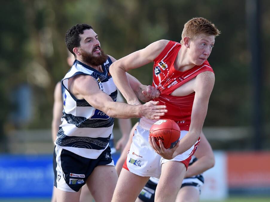 A young Kieran Strachan on his way to his first senior best and fairest award with South Bendigo in 2015.