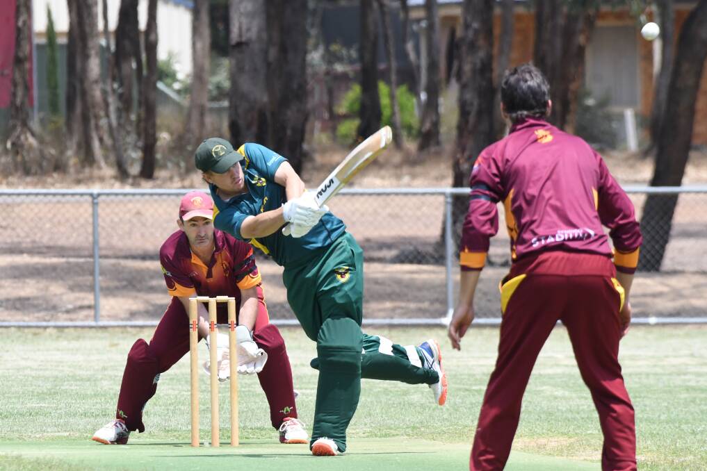 Spring Gully's Rhys Webb goes on the attack in his innings of 77 against Maiden Gully Marist. Picture: NONI HYETT