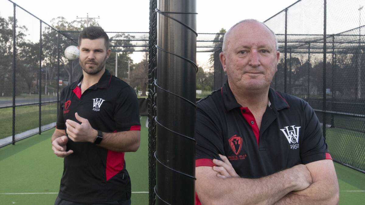 TOP CLASS: White Hills' captain-coach Mitch Winter-Irving and club president Rob Lowes in the Demons' new training nets. Picture: NONI HYETT