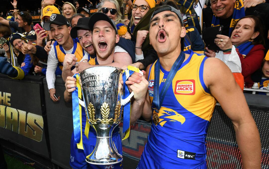 Tom Cole and Daniel Venables with the premiership cup.