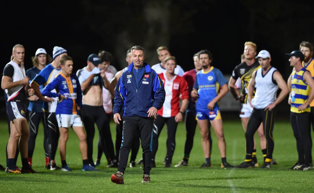 BFNL coach Brett Fitzpatrick in charge of the training squad at Castlemaine on Wednesday night. Picture: GLENN DANIELS