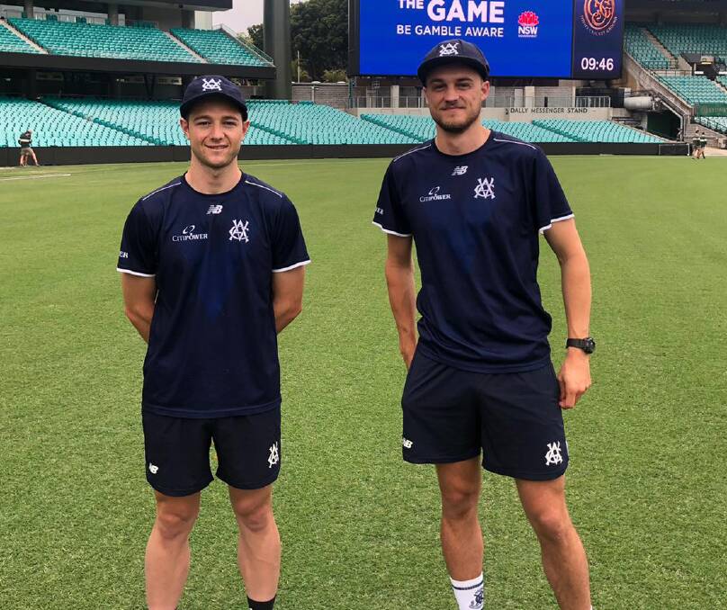 Xavier Crone, right, and Brody Couch after they received their Victorian caps before play on day one. Picture: CRICKET VICTORIA