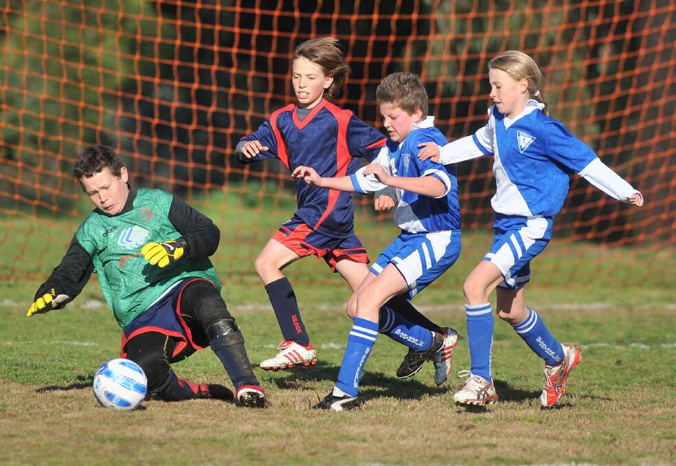 Tayla Vlaeminck, far right, playing soccer for Strathdale against the boys in 2009.