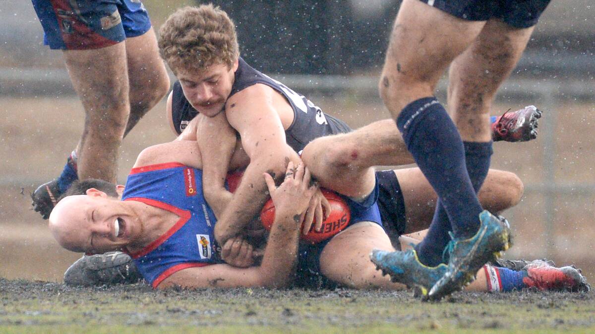 BEST ON GROUND: North Bendigo's Tyson Findlay is wrapped up in a tackle. Picture: DARREN HOWE