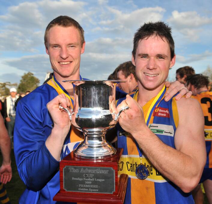 Christian Carter, right, with coach Mark Adamson after they led Golden Square to the 2009 premiership.