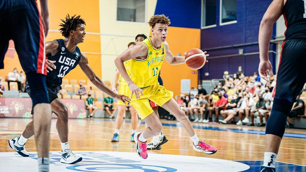 SMOOTH MOVER: Dyson Daniels carves through the United States defence during the under-19 World Cup. Picture: FIBA