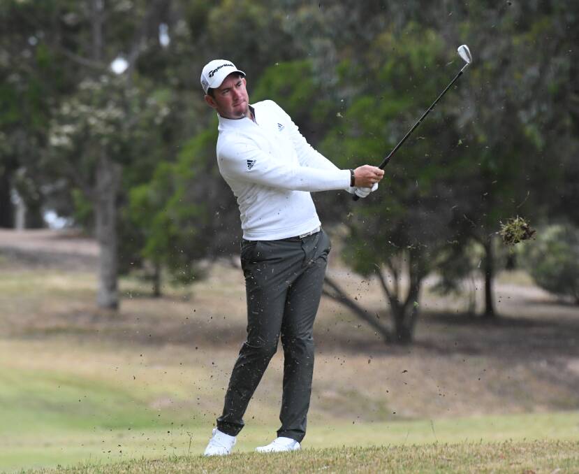 HOME, SWEET HOME: Lucas Herbert plays his approach shot on the first hole at Neangar Park this week. Picture: ADAM BOURKE