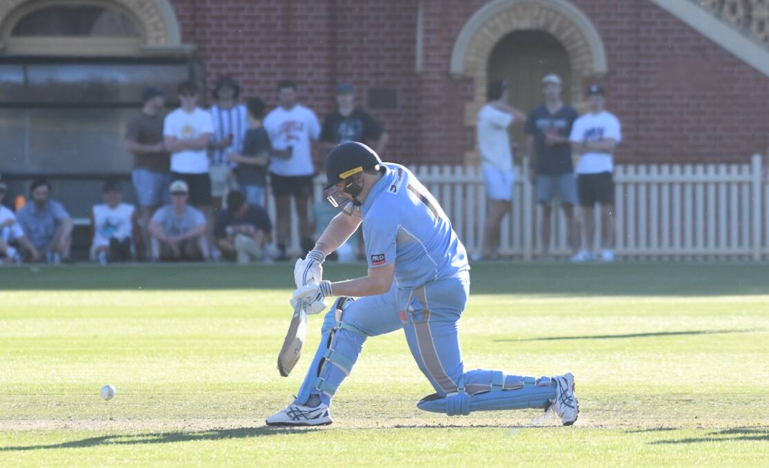 SLAMMER: Sam Johnston belts one of his seven boundaries in Sunday night's Kookaburra Cup T20 final at the QEO. Picture: ADAM BOURKE
