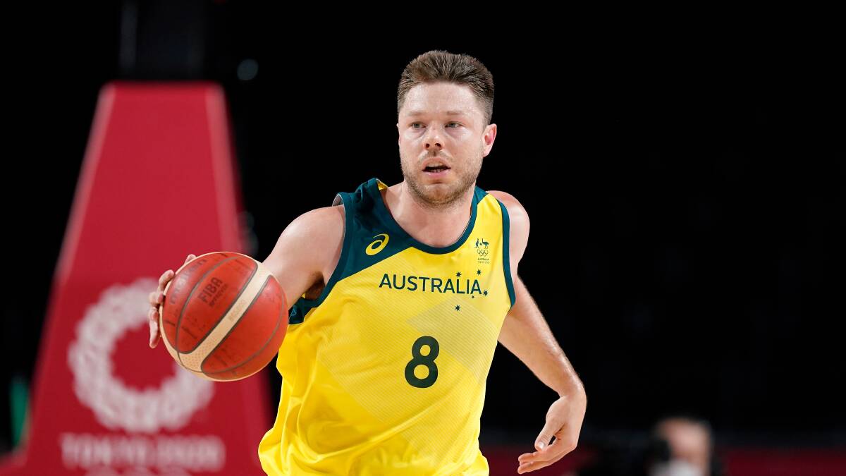 AUSSIE PRIDE: Matthew Dellavedova in action against Nigeria in game one of the Boomers' Olympic campaign. Picture: AP Photo/Charlie Neibergall
