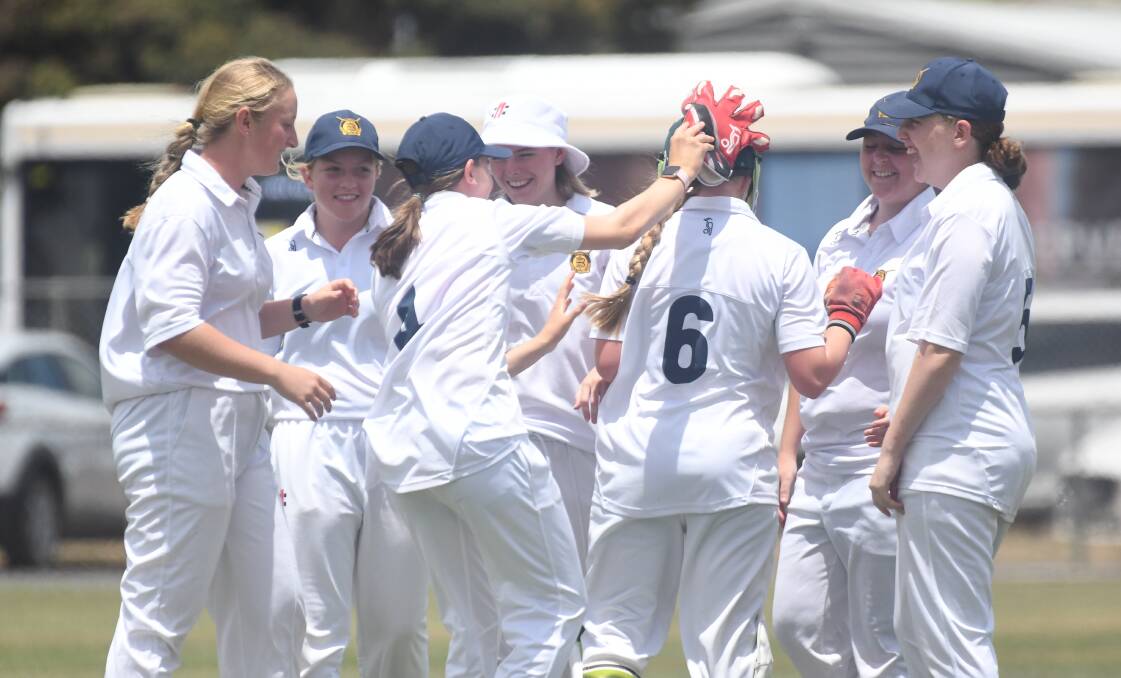 WELL DONE: The BDCA under-17 girls celebrate a wicket against Shepparton.
