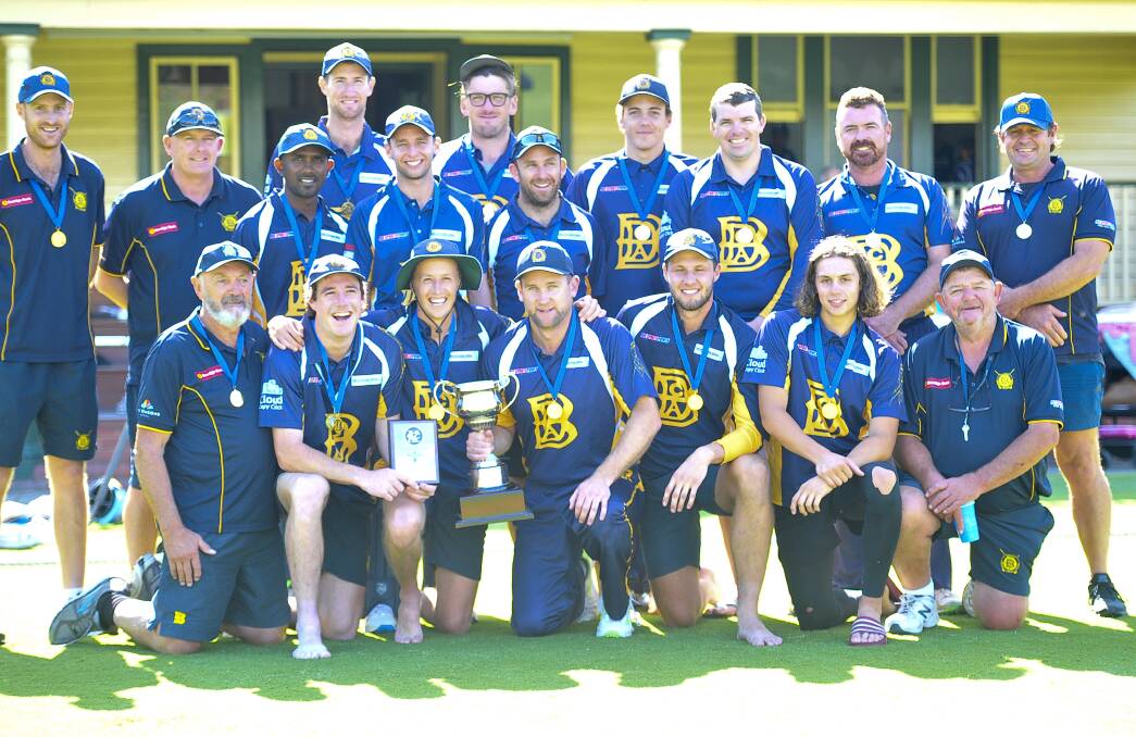 WINNERS ARE GRINNERS: the BDCA players, coaches and officials. Picture: ADAM BOURKE