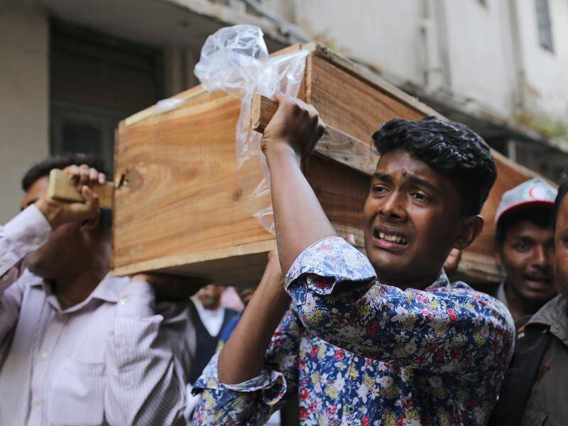 At least 67 people have been killed in a blaze that tore through a densely packed area of Dhaka.