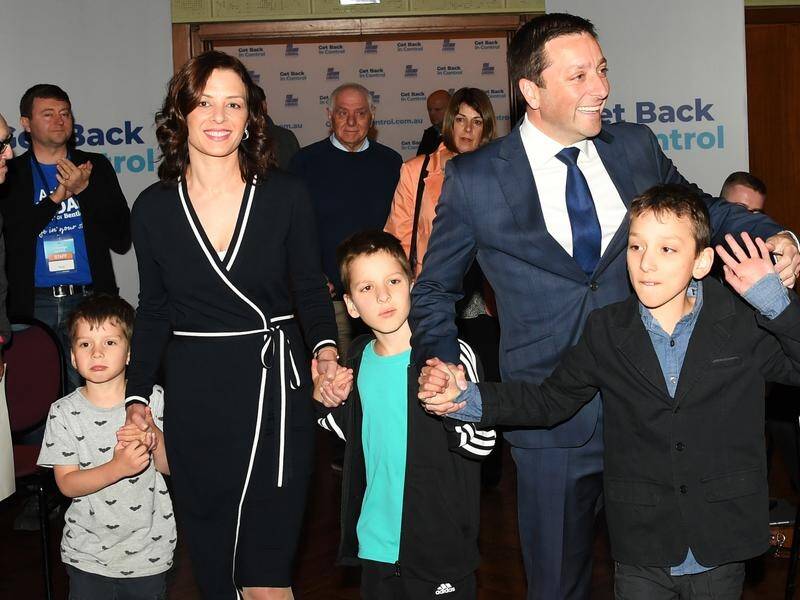 Matthew Guy, with his wife and three sons, has his sights sent on being the next Victorian premier.