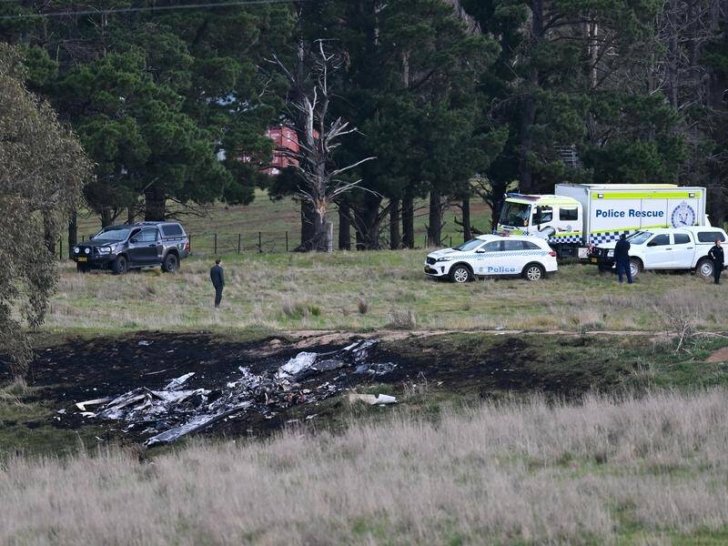 The five-seater Cirrus went down in a paddock in Gundaroo, north of Queanbeyan. (Lukas Coch/AAP PHOTOS)