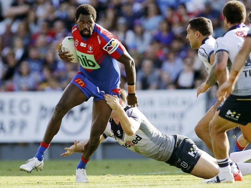 Newcastle's Edrick Lee has signed a two-year deal with the Dolphins.