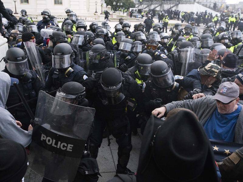 US Capitol Police tried to push back rioters attempting to enter the US Capitol on January 6.
