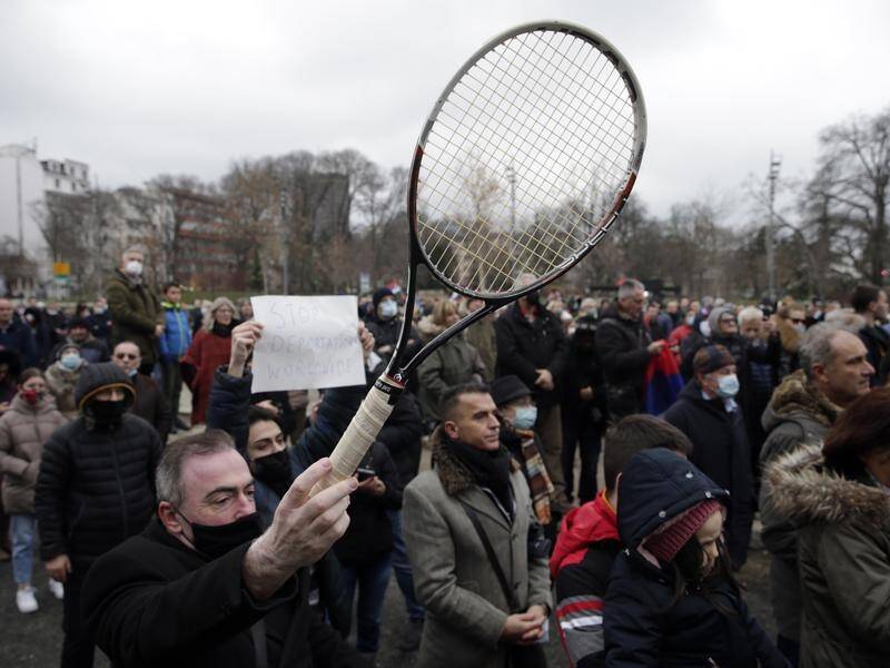 Novak Djokovic's supporters in Belgrade, Serbia, attend a rally in his support.