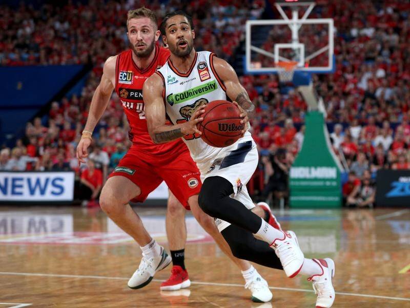 Taipans' Melo Trimble (right) finished with 32 points in the win over Perth Wildcats.