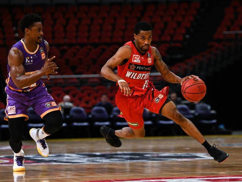 Even with star Bryce Cotton (r) back, Perth Wildcats are being written off as NBL finals contenders.